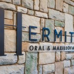 Hermitage Oral Surgery Logo