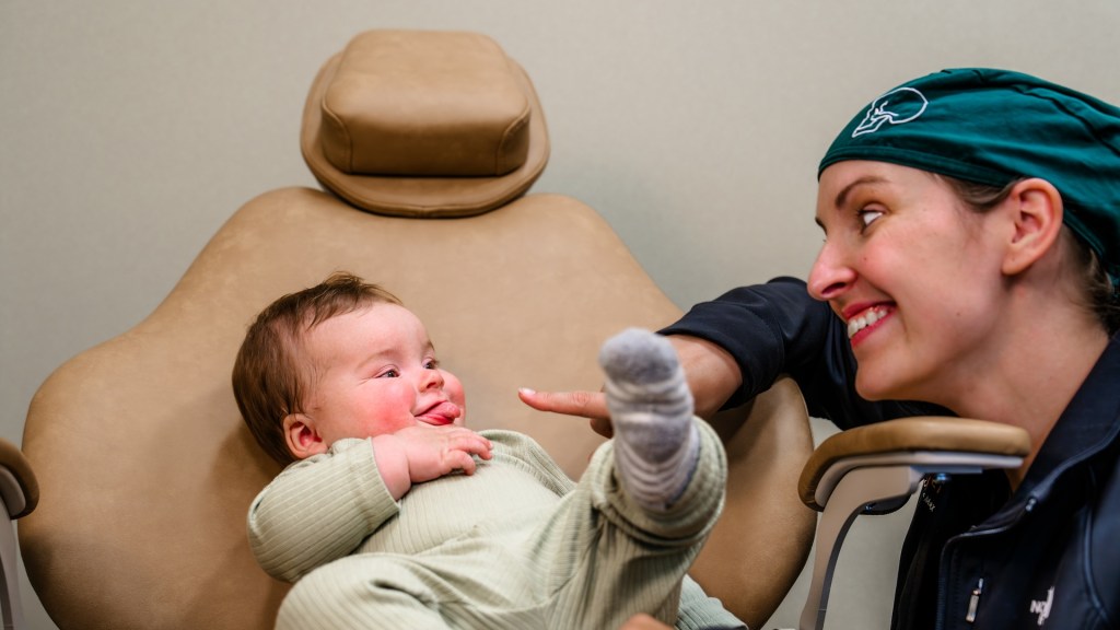 Dr. Yazbak with the baby
